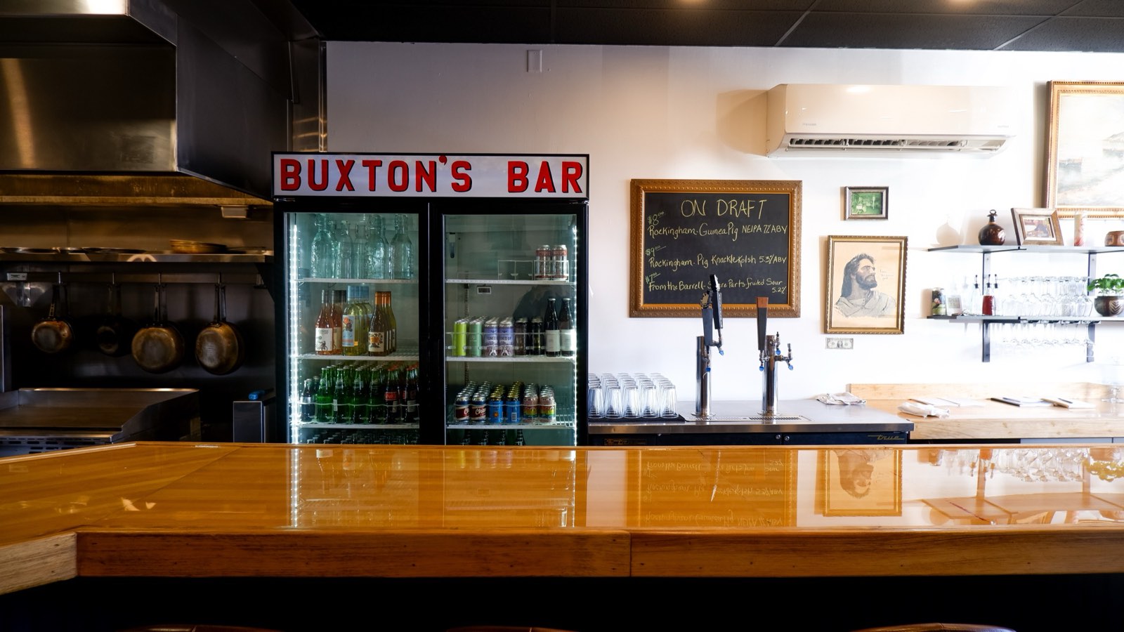 The bar and its chalked draft board